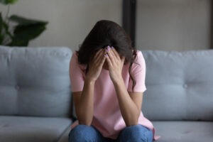 young-woman-upset-on-her-couch