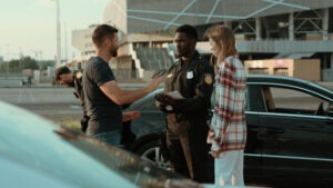 couple talking to the cops after a hit-and-run