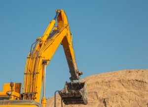 earth mover filling dump truck