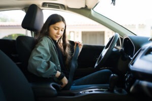 teen driver buckling up
