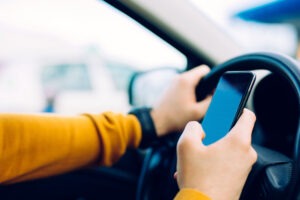 man caught texting while driving
